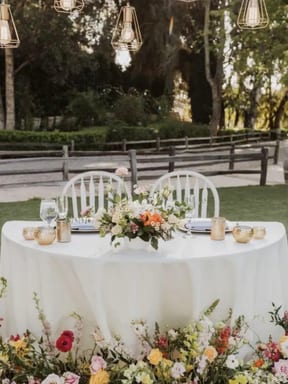 Wedding table with candles and florals